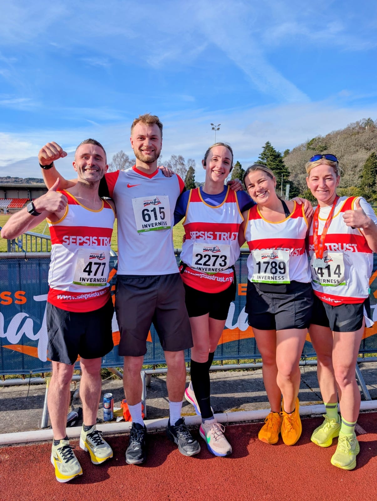 A group shot of people after completing the Inverness Marathon on behalf of the UK Sepsis Trust.