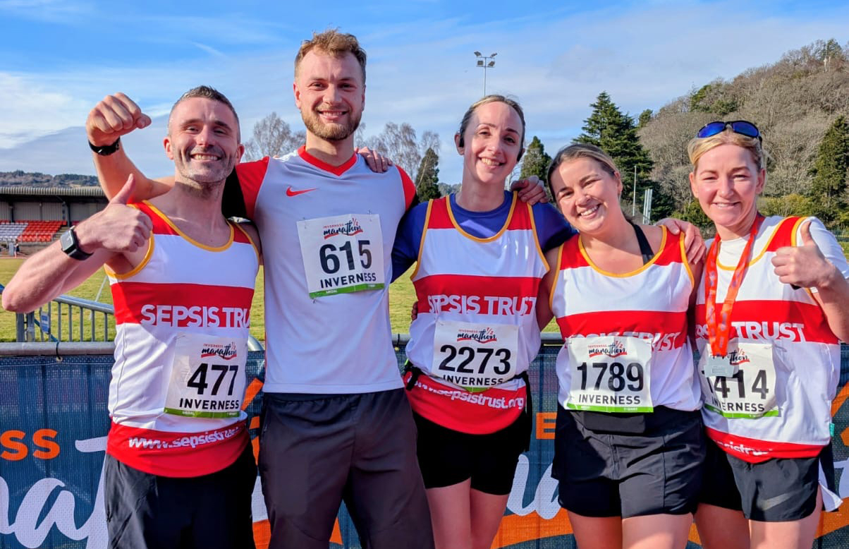 A group shot of people after completing the Inverness Marathon on behalf of the UK Sepsis Trust.